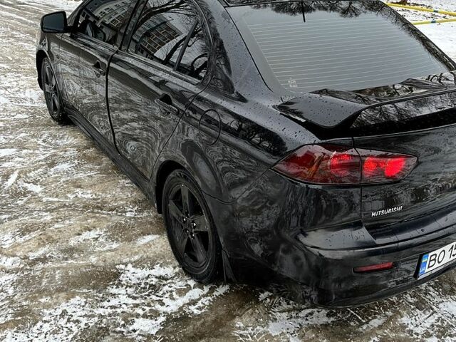 Чорний Міцубісі Lancer, об'ємом двигуна 2 л та пробігом 255 тис. км за 6600 $, фото 8 на Automoto.ua