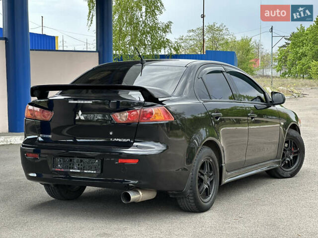 Чорний Міцубісі Lancer, об'ємом двигуна 2 л та пробігом 192 тис. км за 6500 $, фото 1 на Automoto.ua