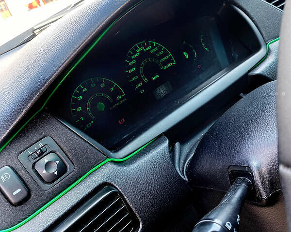 Чорний Міцубісі Lancer, об'ємом двигуна 1.6 л та пробігом 195 тис. км за 5200 $, фото 6 на Automoto.ua