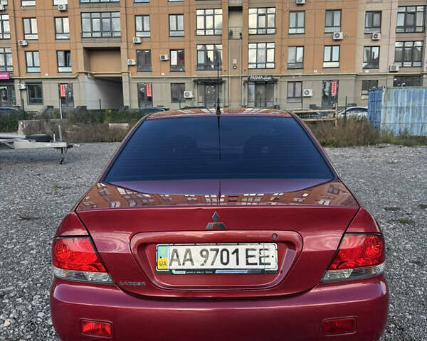 Чорний Міцубісі Lancer, об'ємом двигуна 1.6 л та пробігом 195 тис. км за 5000 $, фото 19 на Automoto.ua