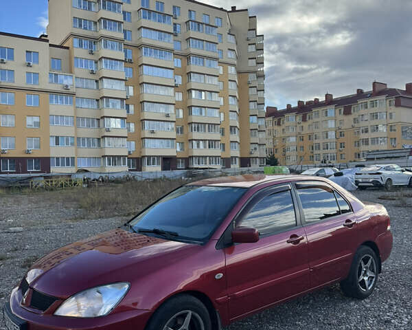 Чорний Міцубісі Lancer, об'ємом двигуна 1.6 л та пробігом 195 тис. км за 5000 $, фото 8 на Automoto.ua
