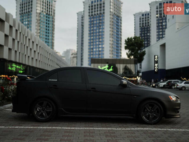 Чорний Міцубісі Lancer, об'ємом двигуна 2 л та пробігом 203 тис. км за 7000 $, фото 36 на Automoto.ua