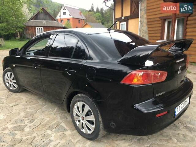 Черный Мицубиси Лансер, объемом двигателя 1.5 л и пробегом 240 тыс. км за 6900 $, фото 15 на Automoto.ua