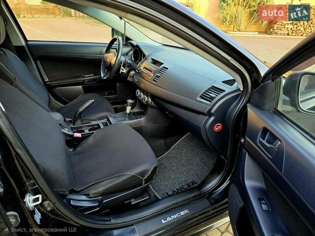 Чорний Міцубісі Lancer, об'ємом двигуна 2 л та пробігом 260 тис. км за 6555 $, фото 34 на Automoto.ua