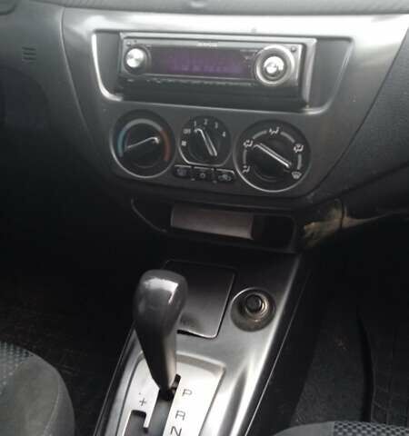 Черный Мицубиси Лансер, объемом двигателя 1.6 л и пробегом 223 тыс. км за 4300 $, фото 3 на Automoto.ua