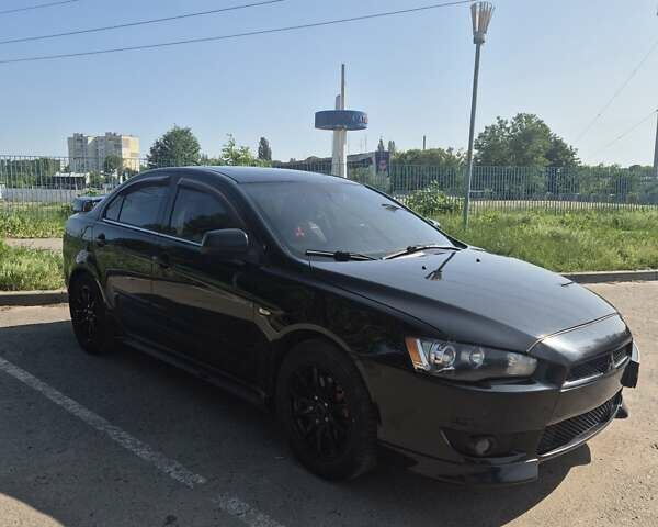 Чорний Міцубісі Lancer, об'ємом двигуна 2 л та пробігом 243 тис. км за 6600 $, фото 5 на Automoto.ua
