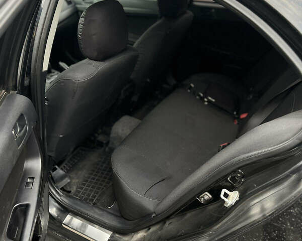 Мицубиси Лансер 2007 в Днепре (Днепропетровске) на Automoto.ua Черный Мицубиси Лансер, объемом двигателя 1.5 л и пробегом 300 тыс. км за 5800 $, фото 5 на Automoto.ua