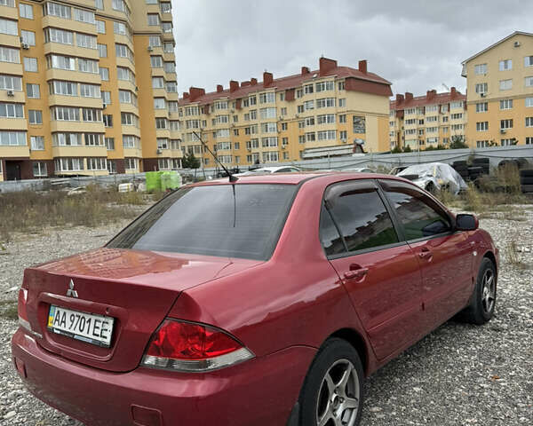 Чорний Міцубісі Lancer, об'ємом двигуна 1.6 л та пробігом 195 тис. км за 5000 $, фото 15 на Automoto.ua