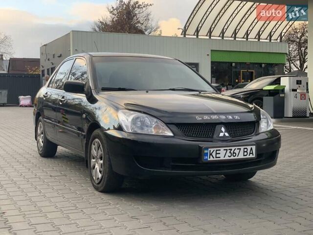 Черный Мицубиси Лансер, объемом двигателя 1.58 л и пробегом 237 тыс. км за 3850 $, фото 6 на Automoto.ua