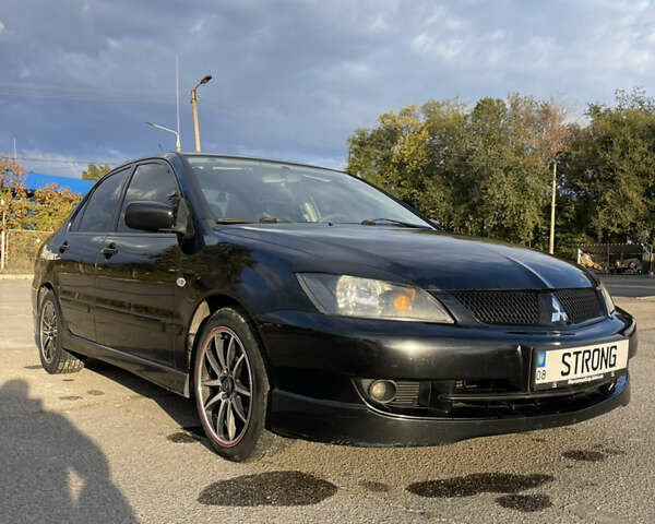 Чорний Міцубісі Lancer, об'ємом двигуна 2 л та пробігом 280 тис. км за 4600 $, фото 8 на Automoto.ua