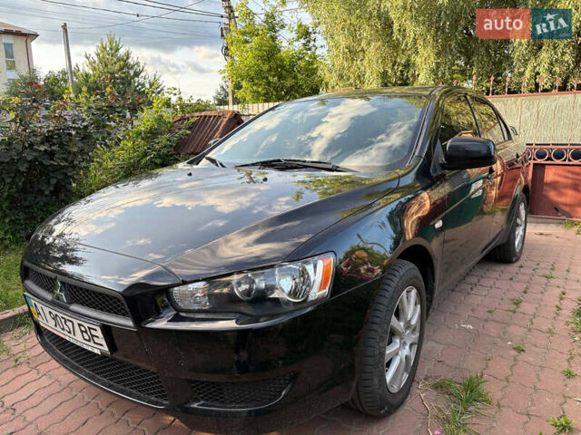 Черный Мицубиси Лансер, объемом двигателя 1.5 л и пробегом 111 тыс. км за 7500 $, фото 1 на Automoto.ua