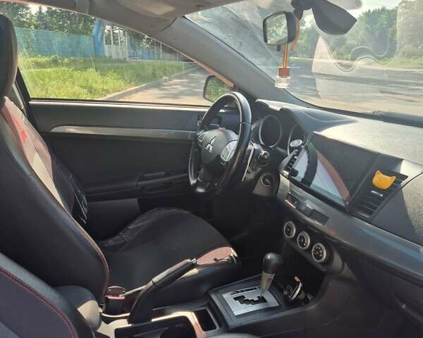 Чорний Міцубісі Lancer, об'ємом двигуна 2 л та пробігом 243 тис. км за 6600 $, фото 24 на Automoto.ua