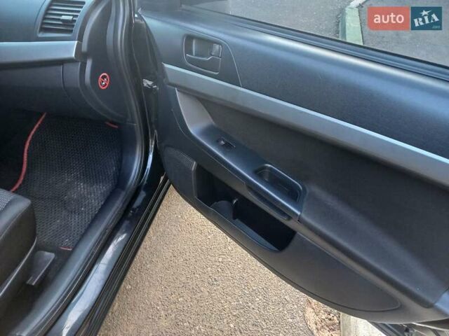 Чорний Міцубісі Lancer, об'ємом двигуна 1.5 л та пробігом 242 тис. км за 5550 $, фото 50 на Automoto.ua