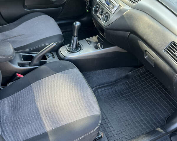 Чорний Міцубісі Lancer, об'ємом двигуна 1.58 л та пробігом 175 тис. км за 5200 $, фото 9 на Automoto.ua