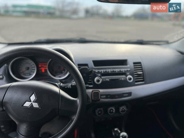 Чорний Міцубісі Lancer, об'ємом двигуна 1.5 л та пробігом 209 тис. км за 5500 $, фото 18 на Automoto.ua