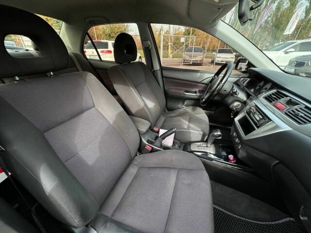 Мицубиси Лансер 2007 в Кривом Роге на Automoto.ua Черный Мицубиси Лансер, объемом двигателя 2 л и пробегом 143 тыс. км за 5400 $, фото 14 на Automoto.ua