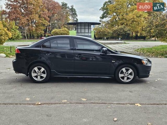 Міцубісі Lancer 2007 у Києві на Automoto.ua Чорний Міцубісі Lancer, об'ємом двигуна 2 л та пробігом 115 тис. км за 5000 $, фото 9 на Automoto.ua