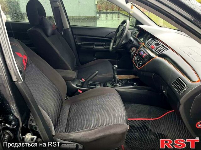 Чорний Міцубісі Lancer, об'ємом двигуна 1.6 л та пробігом 196 тис. км за 3900 $, фото 10 на Automoto.ua