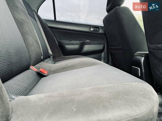 Чорний Міцубісі Lancer, об'ємом двигуна 1.6 л та пробігом 243 тис. км за 4950 $, фото 40 на Automoto.ua