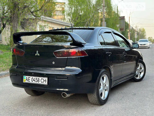 Чорний Міцубісі Lancer, об'ємом двигуна 2 л та пробігом 220 тис. км за 7700 $, фото 3 на Automoto.ua