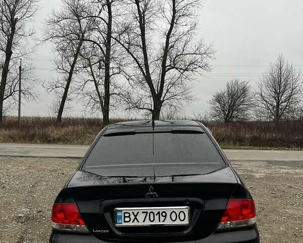 Черный Мицубиси Лансер, объемом двигателя 1.6 л и пробегом 272 тыс. км за 2800 $, фото 1 на Automoto.ua