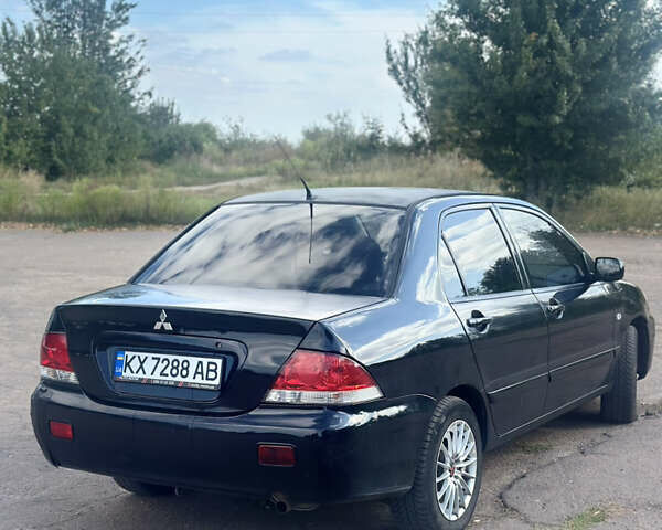 Мицубиси Лансер 2007 в Харькове на Automoto.ua Черный Мицубиси Лансер, объемом двигателя 1.58 л и пробегом 278 тыс. км за 3500 $, фото 5 на Automoto.ua