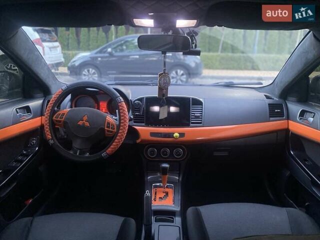 Мицубиси Лансер 2007 в Гостомель на Automoto.ua Черный Мицубиси Лансер, объемом двигателя 2 л и пробегом 258 тыс. км за 7200 $, фото 20 на Automoto.ua