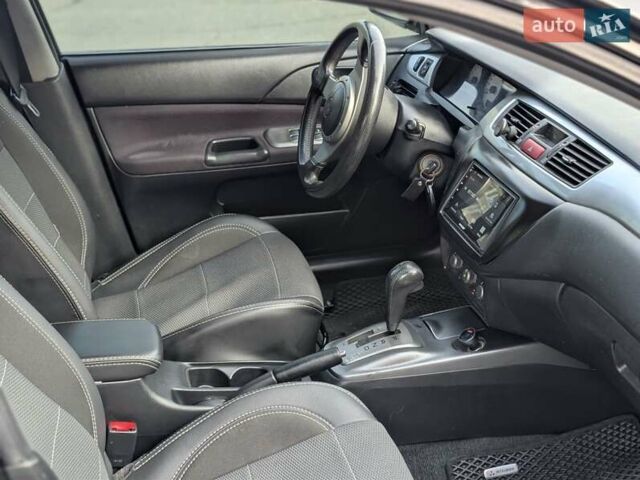 Чорний Міцубісі Lancer, об'ємом двигуна 2 л та пробігом 152 тис. км за 5500 $, фото 14 на Automoto.ua