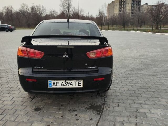 Чорний Міцубісі Lancer, об'ємом двигуна 0.15 л та пробігом 142 тис. км за 7750 $, фото 11 на Automoto.ua