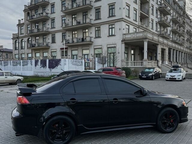 Черный Мицубиси Лансер, объемом двигателя 2 л и пробегом 242 тыс. км за 6200 $, фото 8 на Automoto.ua