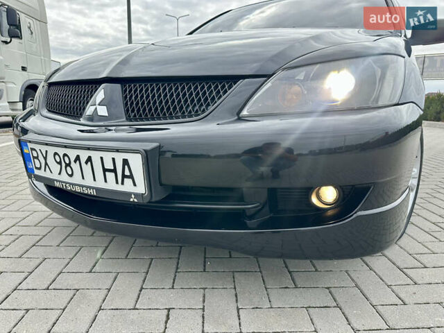 Чорний Міцубісі Lancer, об'ємом двигуна 2 л та пробігом 275 тис. км за 5300 $, фото 31 на Automoto.ua