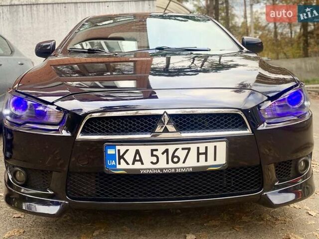 Мицубиси Лансер 2007 в Гостомель на Automoto.ua Черный Мицубиси Лансер, объемом двигателя 2 л и пробегом 258 тыс. км за 7200 $, фото 10 на Automoto.ua