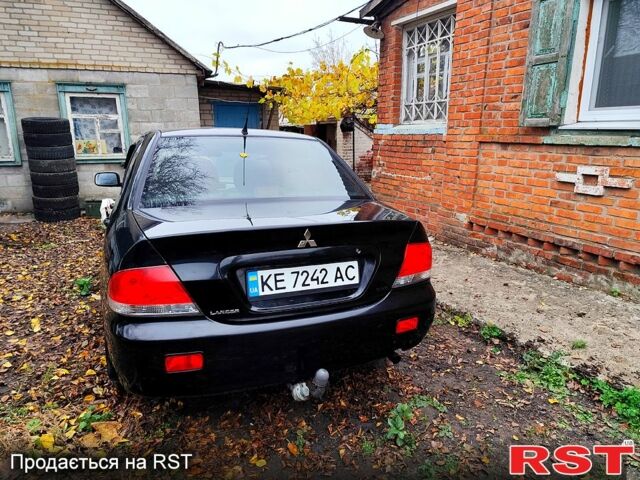 Черный Мицубиси Лансер, объемом двигателя 1.6 л и пробегом 171 тыс. км за 4350 $, фото 2 на Automoto.ua
