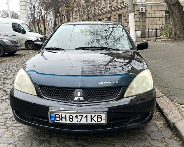 Чорний Міцубісі Lancer, об'ємом двигуна 1.6 л та пробігом 213 тис. км за 3000 $, фото 1 на Automoto.ua