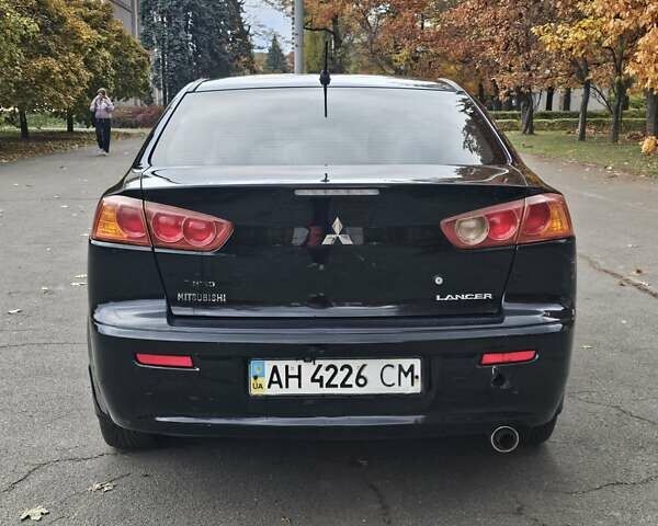 Міцубісі Lancer 2007 у Києві на Automoto.ua Чорний Міцубісі Lancer, об'ємом двигуна 2 л та пробігом 115 тис. км за 5000 $, фото 3 на Automoto.ua