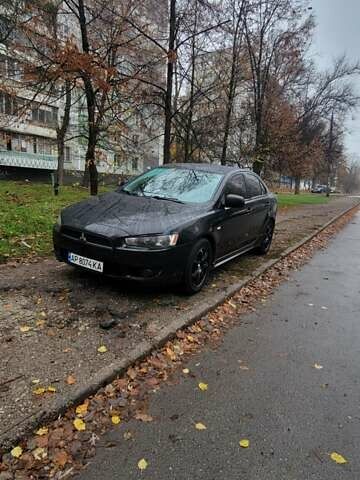 Черный Мицубиси Лансер, объемом двигателя 2 л и пробегом 260 тыс. км за 5500 $, фото 4 на Automoto.ua