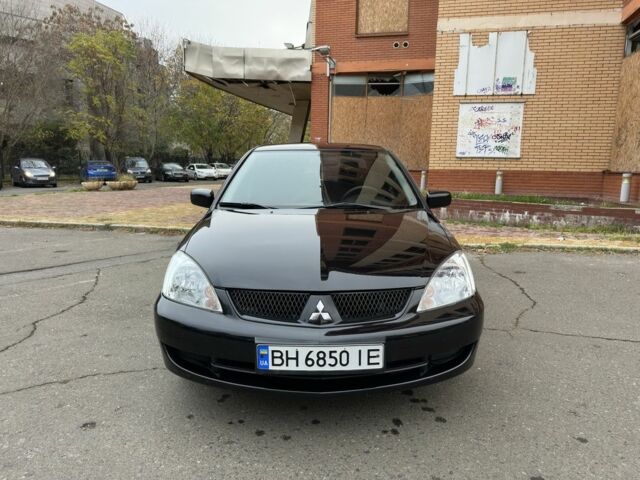 Черный Мицубиси Лансер, объемом двигателя 1.6 л и пробегом 173 тыс. км за 4700 $, фото 7 на Automoto.ua