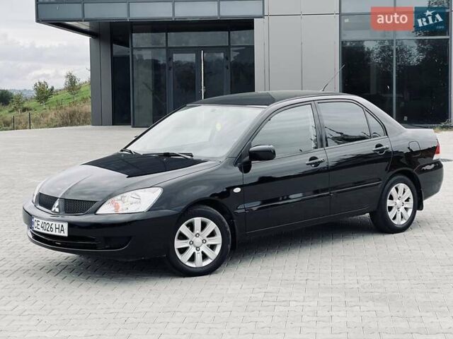 Чорний Міцубісі Lancer, об'ємом двигуна 1.6 л та пробігом 243 тис. км за 4950 $, фото 3 на Automoto.ua