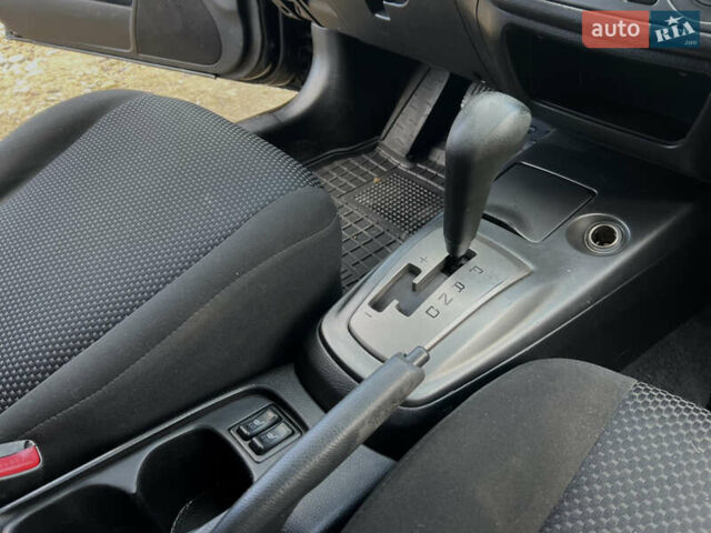 Чорний Міцубісі Lancer, об'ємом двигуна 1.58 л та пробігом 185 тис. км за 3750 $, фото 15 на Automoto.ua