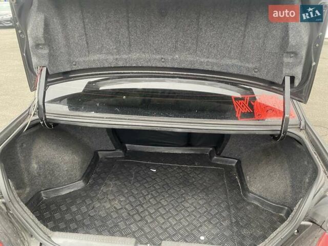 Черный Мицубиси Лансер, объемом двигателя 1.58 л и пробегом 263 тыс. км за 4000 $, фото 14 на Automoto.ua