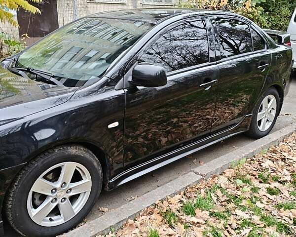 Чорний Міцубісі Lancer, об'ємом двигуна 2 л та пробігом 68 тис. км за 5500 $, фото 4 на Automoto.ua