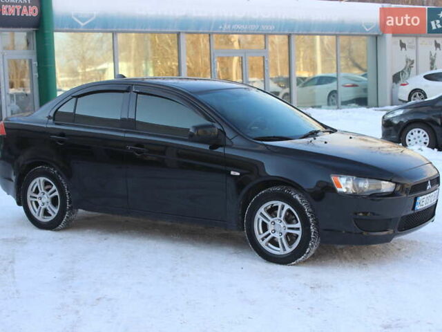 Черный Мицубиси Лансер, объемом двигателя 1.5 л и пробегом 206 тыс. км за 6999 $, фото 7 на Automoto.ua