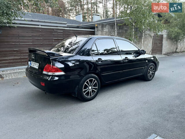Чорний Міцубісі Lancer, об'ємом двигуна 1.58 л та пробігом 278 тис. км за 4800 $, фото 2 на Automoto.ua