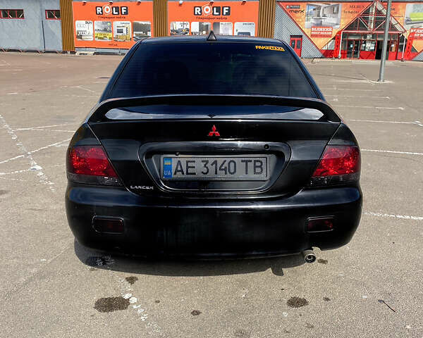 Чорний Міцубісі Lancer, об'ємом двигуна 1.6 л та пробігом 195 тис. км за 5200 $, фото 5 на Automoto.ua
