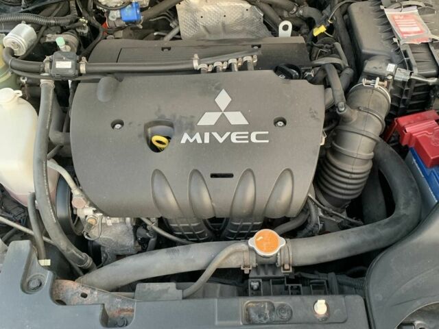 Черный Мицубиси Лансер, объемом двигателя 2 л и пробегом 208 тыс. км за 4300 $, фото 6 на Automoto.ua