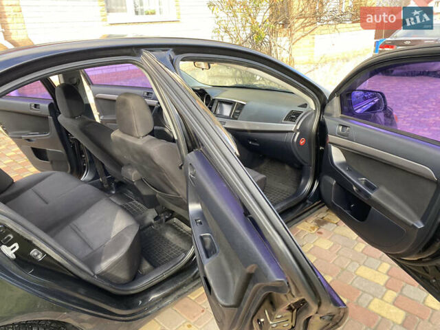Чорний Міцубісі Lancer, об'ємом двигуна 1.5 л та пробігом 240 тис. км за 5650 $, фото 30 на Automoto.ua