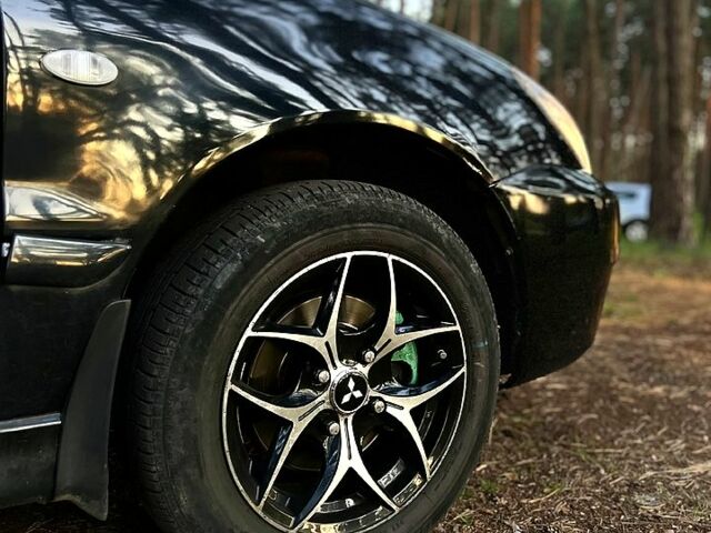 Чорний Міцубісі Lancer, об'ємом двигуна 1.6 л та пробігом 224 тис. км за 4500 $, фото 3 на Automoto.ua