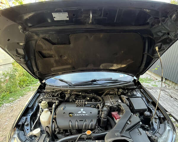 Чорний Міцубісі Lancer, об'ємом двигуна 2 л та пробігом 230 тис. км за 6700 $, фото 8 на Automoto.ua