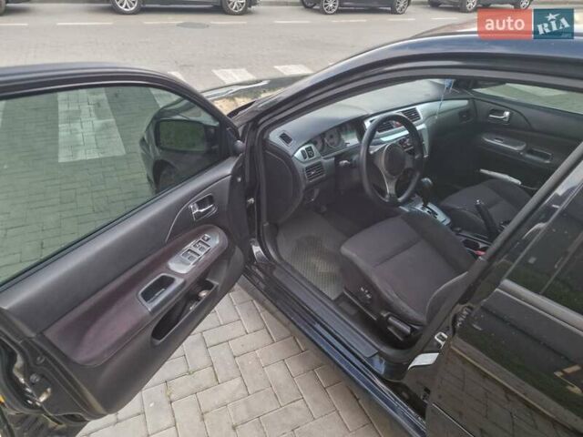 Чорний Міцубісі Lancer, об'ємом двигуна 2 л та пробігом 272 тис. км за 4750 $, фото 14 на Automoto.ua