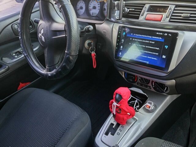 Чорний Міцубісі Lancer, об'ємом двигуна 1.6 л та пробігом 3 тис. км за 4500 $, фото 11 на Automoto.ua